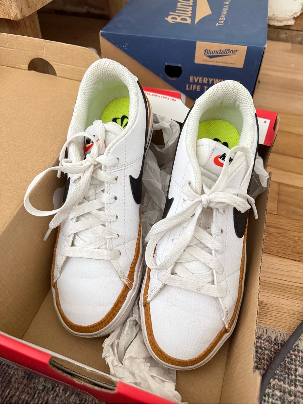 Nike Women’s White Sneakers with Black Swoosh and Brown Trim